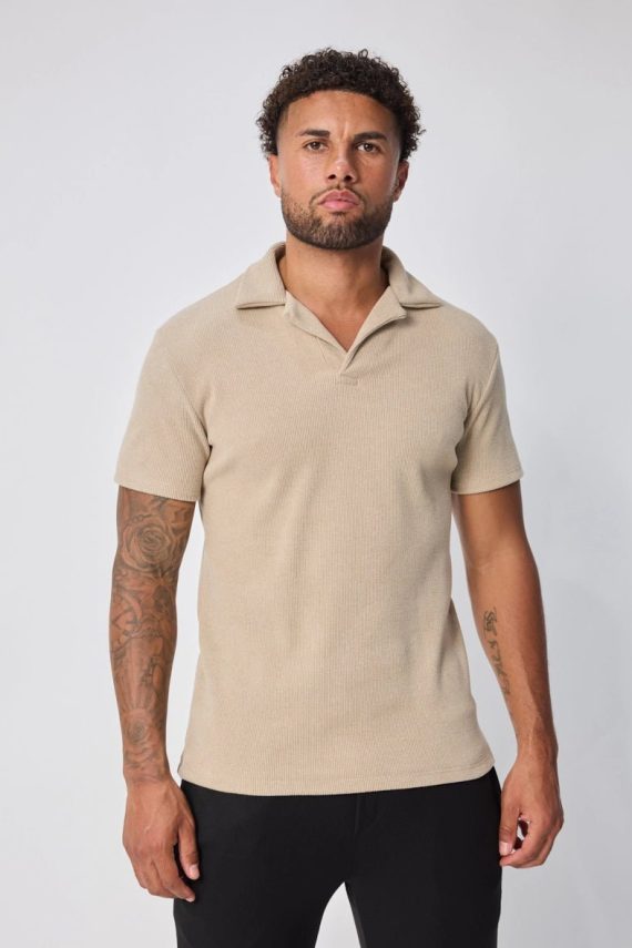 Effen poloshirt met V-hals en manchetten