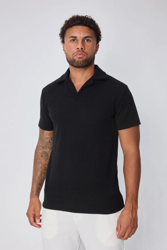 Polo uni col v à revers